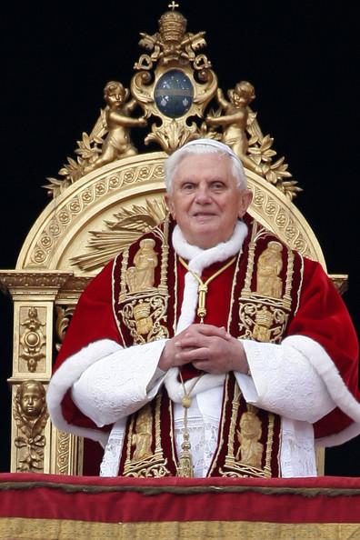 Pope Benedict XVI delivers his 'urbi et orbi' blessing (to the city and to the world) from the central balcony of St Peter's Basilica on December 25, 2009 in Vatican City, Vatican.