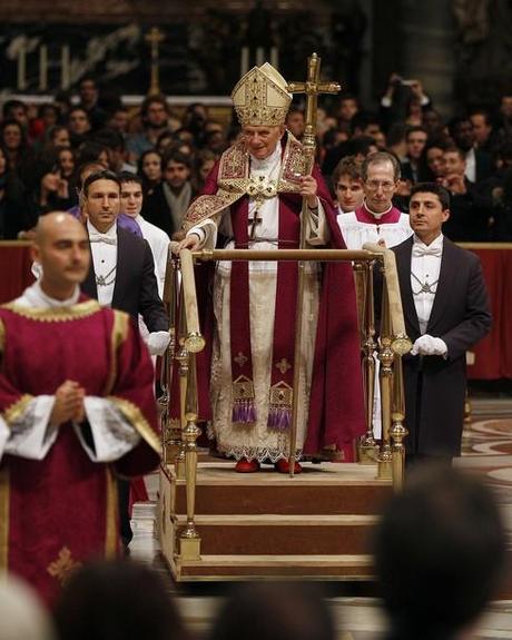 Pope Benedict XVI leaves at the end of a Vesper prayer in St. Peter's Basilica at the Vatican December 15, 2011.