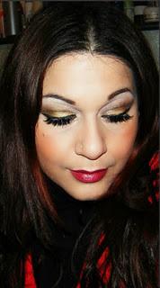 makeup delle feste oro e marrone con labbra rosse