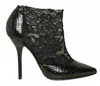 Dolce & Gabbana presenta i tronchetti in pizzo e pitone
