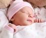 Portrait of a newborn girl sleeping. Portrait of a newborn girl sleeping.