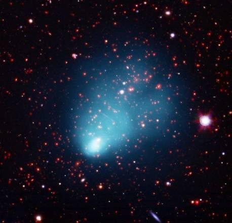 Un'immagine composita di 'El Gordo', l'ammasso galattico  ACT-CL J0102-4915 (Fonte: raggi X: NASA/CXC/Rutgers/J. Hughes et al; Ottico: ESO/VLT & SOAR/Rutgers/F. Menanteau; IR: NASA/JPL/Rutgers/F. Menanteau) 