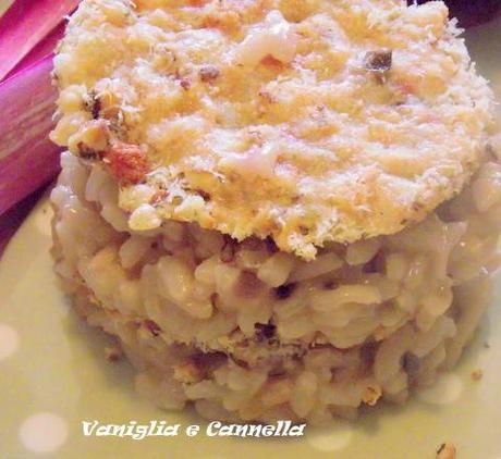 Risotto con cialda di parmigiano alle nocciole