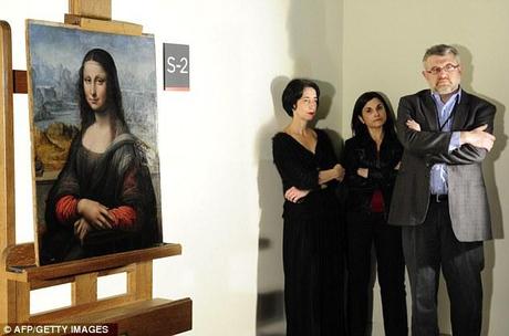 Rare discovery: Employees of Madrid's Prado Museum stand next to the authenticated contemporary copy of Leonardo da Vinci's Mona Lisa