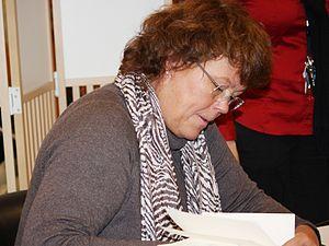 English: Norwegian writer Anne Holt signing he...