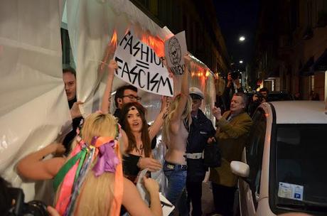 The Activist of FEMEN Protest Outside the Versace Show