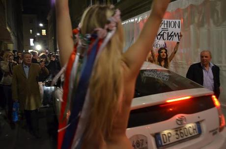 The Activist of FEMEN Protest Outside the Versace Show