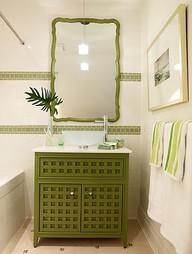 Smart bathroom on a budget - using accent tiles on floor at corners of basic tiles